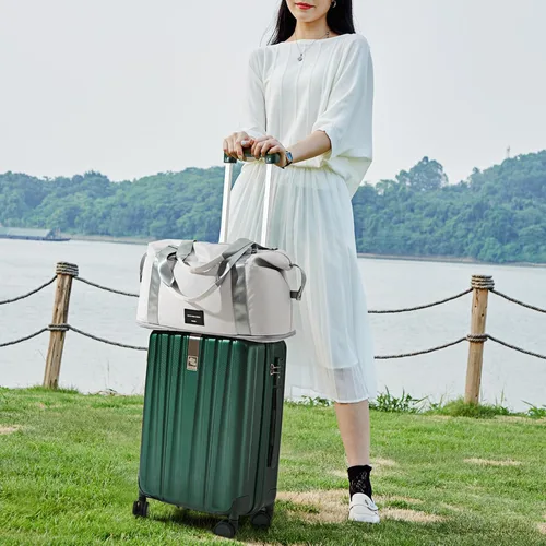 Vista 8 de Hanke Bolsa de viaje expandible de 39 litros, bolsa de lona plegable para viajes, bolsas de mano de fin de semana para mujeres con múltiples Gris