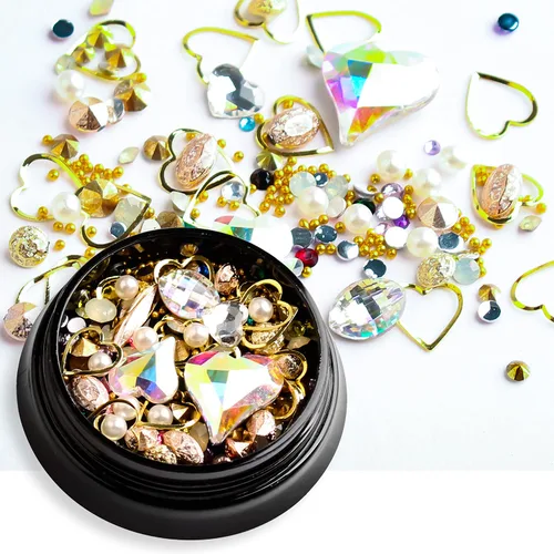 Vista 3 de 6 cajas de dijes de uñas 3D dorados, dijes de arte de uñas con parte trasera plana, joyas de diamantes de imitación para uñas, gemas de uñas