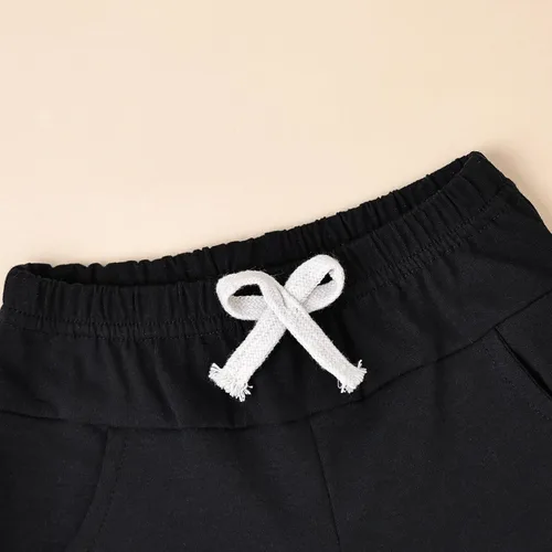 Vista 23 de Ropa para bebé niño pequeño, trajes de verano de manga corta, camiseta de retazos y pantalón con bolsillo, conjunto de 2 piezas, 12 meses a 4 años