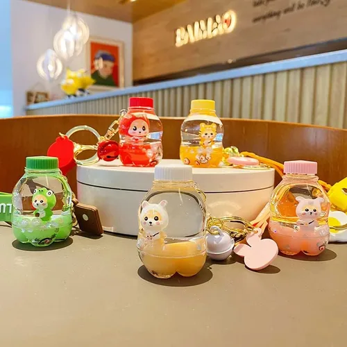 Vista 4 de BEXOA Lindo llavero líquido para regalo de Navidad Dijes de mochila Kawaii Shiba Inu llaveros flotantes para mujer
