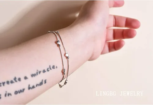 Vista 2 de LINGBG JEWELRY Pulseras en capas de plata de ley 925, pulseras de amor con corazón, pulseras de estrella para mujer, pulseras de doble hebra