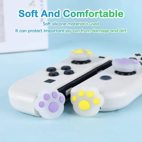 Vista 5 de DLseego 4 tapas de agarre para pulgar en forma de pata de gato, para interruptor regularSwitch LiteSwitch OLED Joy Con Joystick de silicona suave