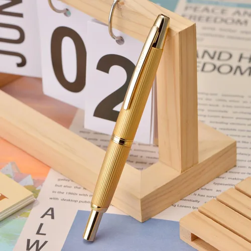 Vista 3 de Jinhao 10 Press Pluma estilográfica con caja, punta mediana retráctil de oro mate cepillado con juego de convertidor de tinta (clip dorado)