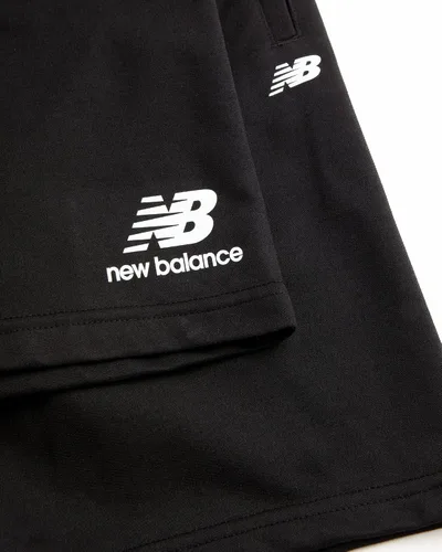 Vista 4 de New Balance Pantalones cortos deportivos para niños, paquete de 2 pantalones cortos de gimnasio de rizo francés de rendimiento activo (4-16)
