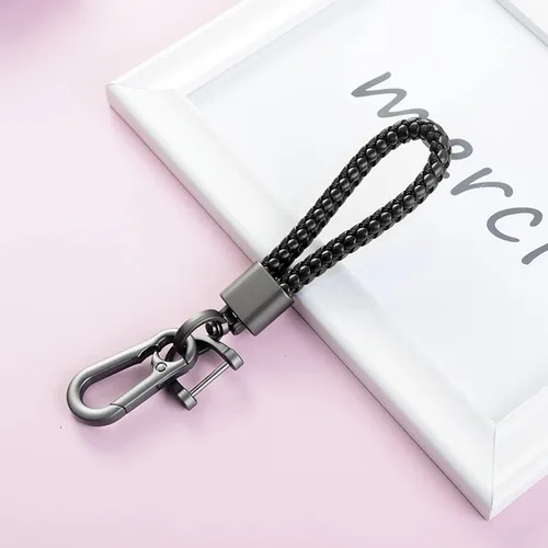 Vista 7 de Llavero de llaves de coche con bellota y trenzado en paracord, llavero de cuero trenzado grueso para hombres y mujeres, adecuado para todos los Negro