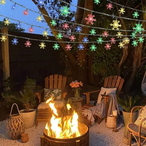 Vista 6 de AUAUY Guirnalda de luces de copos de nieve, 40 luces LED de 19.6 pies, funciona con pilas, 2 modos, luces impermeables para exteriores, interiores