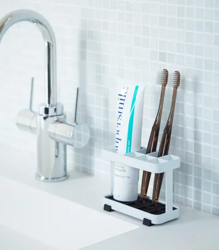 Vista 2 de YAMAZAKI Home Tower Soporte para cepillo de dientes y pasta de dientes para encimera de baño - Acero