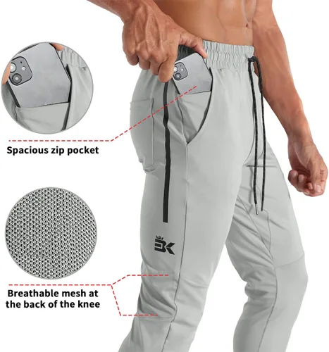 Vista 19 de BROKIG Pantalones deportivos ligeros para hombre, elásticos, de secado rápido, con bolsillos con cremallera