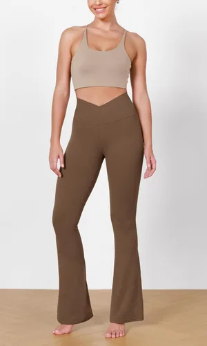 Vista 4 de ODODOS Cloud Feeling - Pantalones acampanados cruzados con bolsillos para mujer, cintura cruzada, corte de bota, pantalones de yoga, 3032 pulgadas