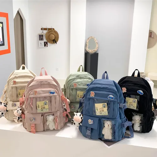 Vista 7 de Mochila Kawaii con lindos accesorios con colgante de pasador de viaje, bolsa grande para portátil al aire libre, impermeable, casual, mochila