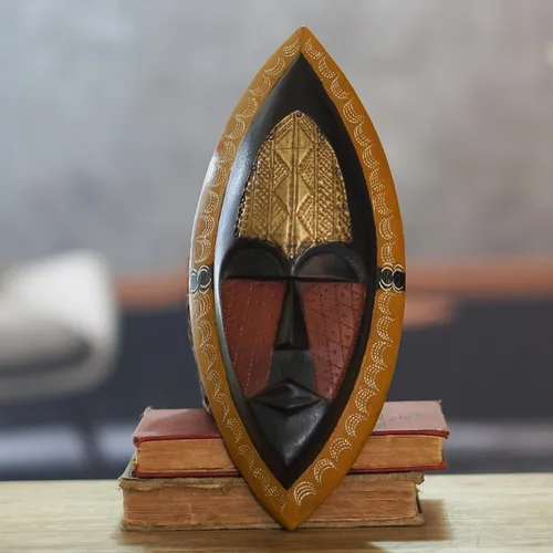 Vista 2 de NOVICA Máscara de pared africana de madera de Sese negra y roja con detalles de latón, 'Una bendición de paz