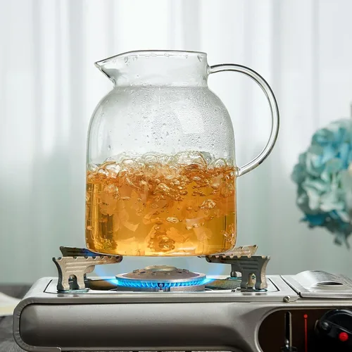 Vista 5 de Unbreakable - Jarra de vidrio con asa y tapa, tarro de vidrio de 68 onzas líquidas con tapa, resistente al calor, jarra de borosilicato para té