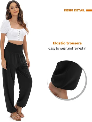 Vista 3 de QIANXIZHAN - Pantalones deportivos de tiro alto para mujer, diseño estilo harén bohemio con bolsillos, para yoga