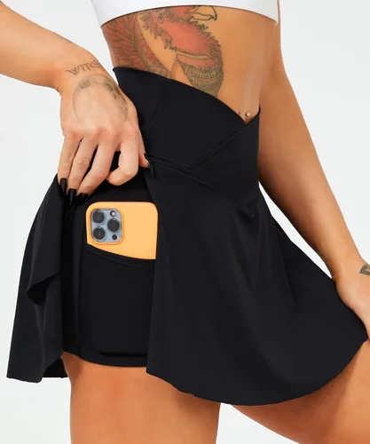 Vista 3 de Navneet Falda de tenis plisada para mujer con bolsillos, pantalones cortos cruzados de cintura alta atlética para golf, faldas deportivas