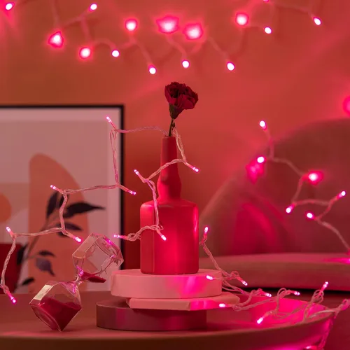 Vista 2 de YULETIME - Tira de 300 luces LED rosadas de color blanco cálido de 100 pies con adaptador de 8 modos, 4 pulgadas de espacio, cable transparente Rosa
