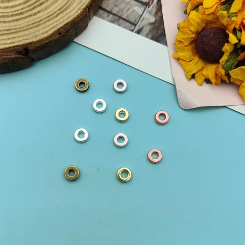 Vista 7 de 1000 cuentas espaciadoras redondas planas para manualidades, cuentas de disco de 5 colores para hacer joyas, pulseras, collares, aretes y 1000pcs; 5