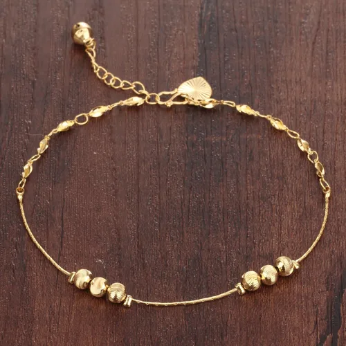 Vista 2 de Tobillera para mujer tono dorado de 18 quilates con cuentas de la suerte, cadena de hueso de serpiente, accesorio ajustable de 9.4in de largo
