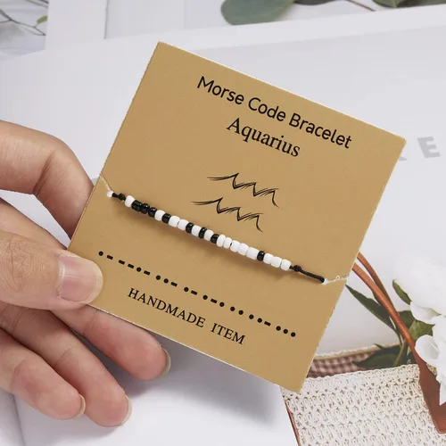 Vista 6 de INENIMARTJ Pulseras de constelación con código morse, 12 pulseras del zodiaco de constelación, cuentas de semillas negras y blancas en cordón