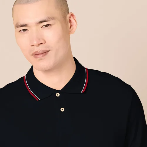 Vista 4 de Tienda Essentials Camiseta polo para hombre de manga corta y ajuste ajustado de algodón piqué