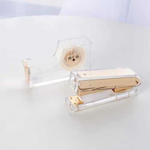 Vista 6 de Elegante grapadora de acrílico ultra transparente para suministros de oficina, grapadora de escritorio dorada mate con 1000 grapas para accesorios
