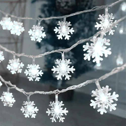 Vista 8 de Luces de Navidad, 20 pies, tira de 40 luces led con forma de copo de nieve, azules, funciona con pilas, guirnalda de luces para dormitorio, patio