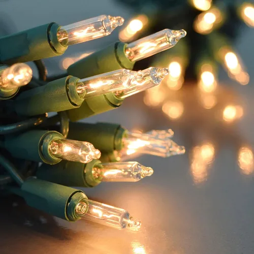 Vista 4 de FUNPENY Luces de Navidad, 30 pies 150 luces incandescentes, minicadena de luces transparentes, blanco cálido con cable verde para árbol de Navidad