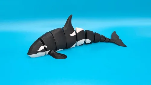 Vista 4 de Ballena Orca flexible Ballena impresa en 3D Ballena de juguete Mini Orca Juguete para niños Cuerpo articulado (una ballena)