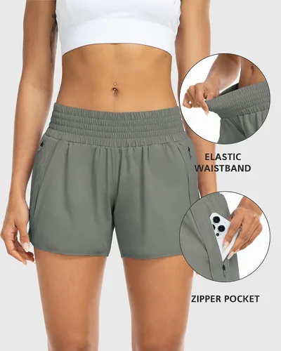 Vista 4 de YEZII Pantalones cortos deportivos para mujer con bolsillos, cintura alta, pantalones cortos de entrenamiento para correr, gimnasio, yoga