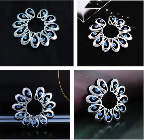 Vista 4 de CrazyPiercing 1 par de anillos de pezón falsos de acero quirúrgico con cristales falsos tribales de cristal sintético azul, Acero inoxidable