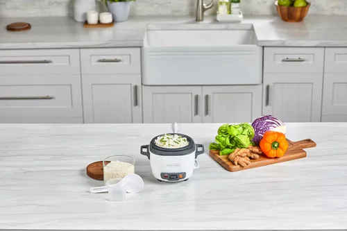 Vista 9 de BLACK+DECKER Olla arrocera de 3 tazas, RC503, 1.5 tazas de arroz crudo, cesta de cocción al vapor, recipiente antiadherente extraíble, un toque