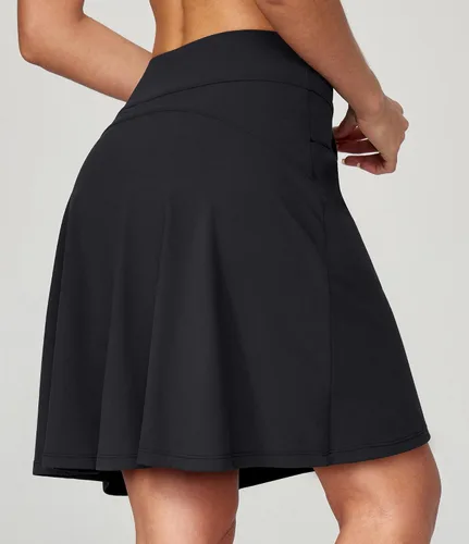 Vista 2 de Ewedoos Falda pantalón hasta la rodilla para mujer con 3 bolsillos, cintura alta, 20 pulgadas, falda de golf para mujer, falda de tenis atlética