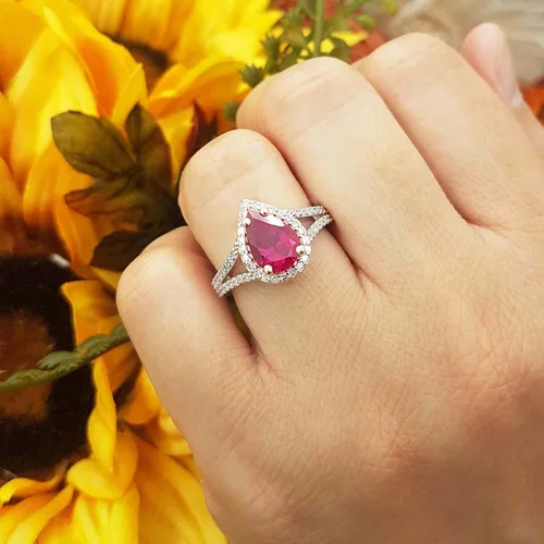 Vista 64 de Dazzlingrock Collection Anillo de compromiso con forma de lágrima y diamante blanco natural redondo de 0.45 quilates con halo de diamantes blancos