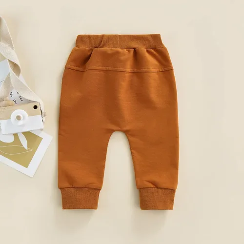 Vista 4 de Mubineo Pantalones deportivos básicos lisos para bebés, niños y niñas, cómodos pantalones de algodón con bolsillos