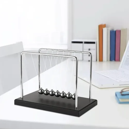 Vista 6 de LANIAKEA Newtons Cradle Balance Balls Newtons Cradle Pendulum con 7 bolas, base de madera negra, bola de equilibrio, oficina, hogar, decoración