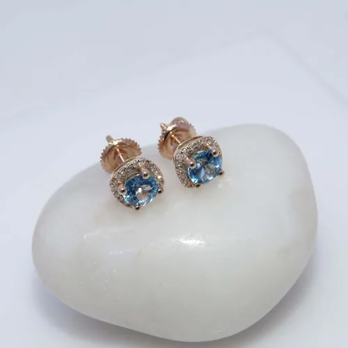Vista 2 de Dazzlingrock Collection Aretes de tuerca redondos de 0.197 in con halo de diamante blanco para mujer, en oro rosa de 10 quilates