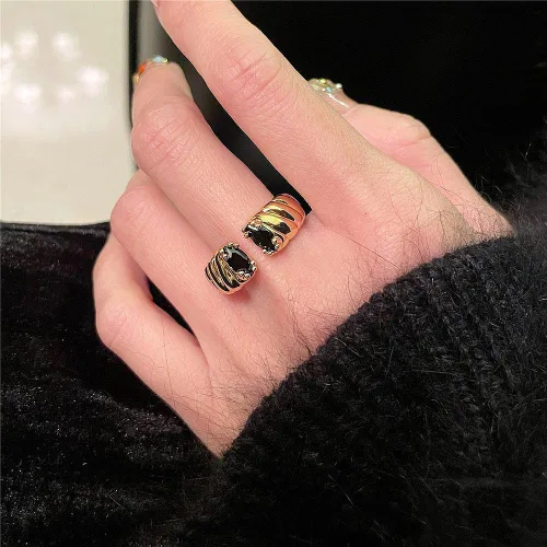 Vista 5 de Anillo trenzado de acero inoxidable chapado en oro vintage con circonita cúbica ovalada, ajustable, para mujer