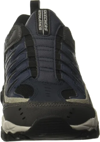 Vista 2 de Skechers Afterburn - Tenis deportivos de entrenamiento con espuma viscoelástica para hombre Strike On