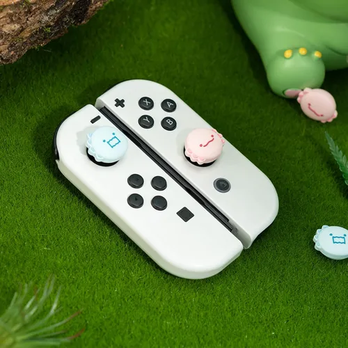 Vista 7 de GeekShare Bonitas tapas de silicona para el pulgar, funda de joystick compatible con Nintendo SwitchOLEDSwitch Lite, 4 unidades, dinosaurio y ajolote