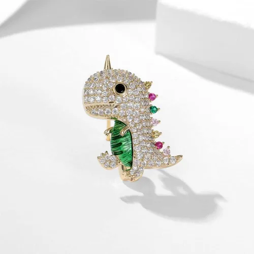 Vista 2 de Bonitos broches de dinosaurio brillantes con circonita cúbica, delicado broche de animales de dibujos animados de lujo, clásico para fiestas