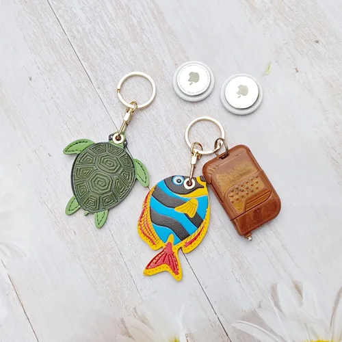 Vista 46 de CATCH ON Paquete de 2 fundas de cuero para Airtag para llavero, bonitos accesorios Kawaii adecuados para Airtag
