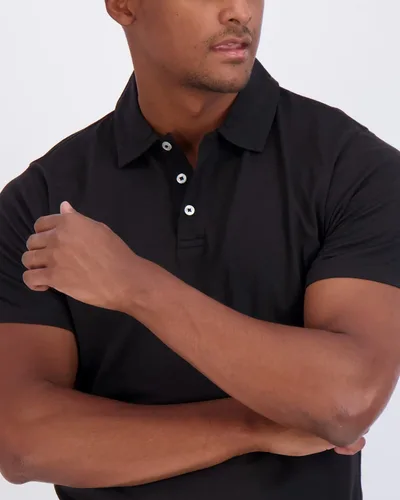 Vista 45 de Real Essentials Paquete de 3: Polo de manga corta de algodón para hombre, de secado rápido, transpirable, (disponible en tallas grandes y altas)