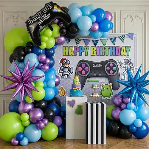 Vista 17 de Decoraciones de fiesta de cumpleaños con temática de circo e incluyen guirnalda de globos rojos, azules y amarillos y globos de papel de aluminio