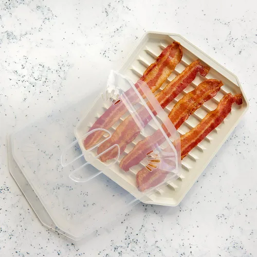 Vista 2 de Nordic Ware Estante para tocino con tapa, 10.25x8x2 pulgadas