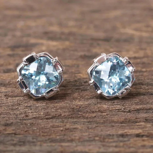 Vista 2 de NOVICA Aretes artesanales hechos a mano con topacio azul, chapados en rodio de Tailandia, plata de ley 925, piedra preciosa con piedra natal