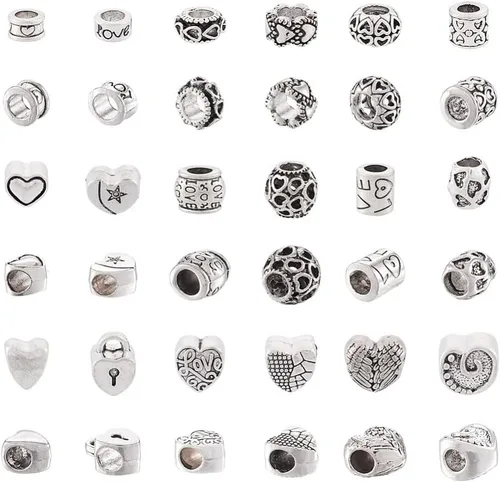 Vista 24 de Craftdady 600 cuentas espaciadoras tibetanas de 10 estilos, colores mezclados, aleación de metal, dijes para pulseras, collares, suministros