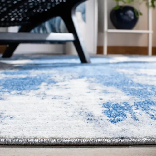 Vista 3 de SAFAVIEH Jasper Collection - Alfombra decorativa de 2 x 4 pies, azul y marfil, diseño abstracto moderno, no desprende pelusa y de fácil cuidado