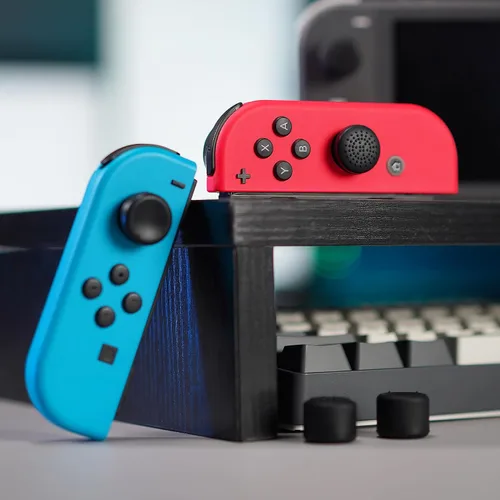 Vista 8 de eXtremeRate 4 pares de fundas negras de silicona antideslizante de longitud extendida para Nintendo Switch y Switch OLED Joy-con Controller, tapas