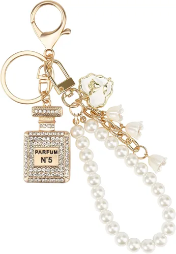 Vista 2 de Lindo llavero de perfume para mujeres y niñas, con diamantes de imitación, bolso de mano, dijes para guitarra, coche, llaveros, bolsa, mochila