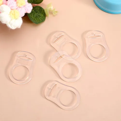 Vista 6 de 10 anillos adaptadores de silicona para bebés y clip compatibles con MAM (suave y transparente)
