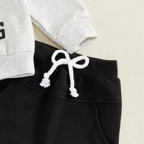 Vista 23 de Conjunto de 2 piezas de ropa para bebé y niño, sudadera con cuello redondo con letras y pantalones casuales de otoño e invierno B Negro-marrón